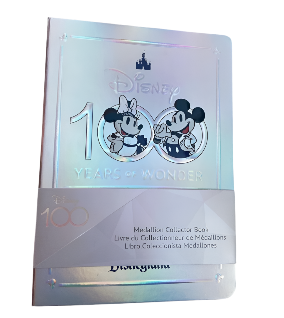 Disneyland 100 years of Disney Medallion collector’s book